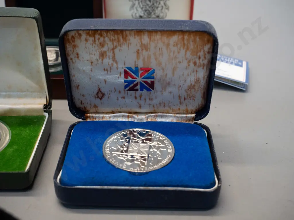 4 boxed coins - 20c coin, one dollar, one dollar commononwealth games & 1994 winter olympics Image 1++