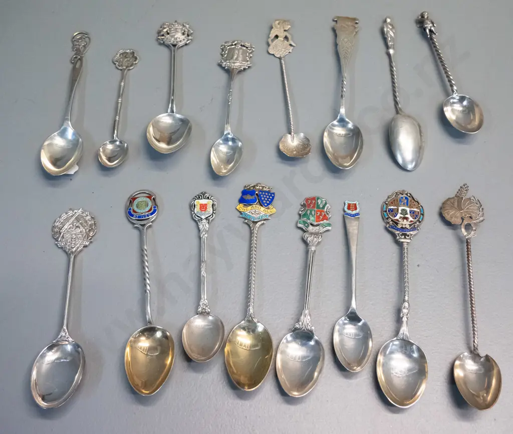 16 assorted sterling silver teaspoons, some place name souvenir, some figural, some with enamel decoration Image 1++