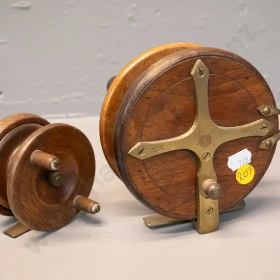 2 timber and brass fly fishing reels, larger one marked "Sun" D-125