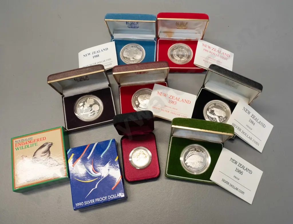 8 cased dollar coins (endangered wlidlife, Royal visit) and $10 coin (1995 mining) Image 1++