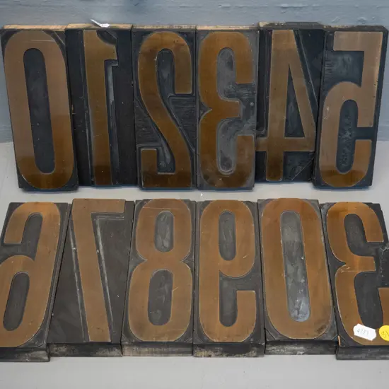 12 reproduction (or refinished vintage?) printing blocks - numbers, 0 thru 9 and spare 3 and 0. Each H-150 W-60