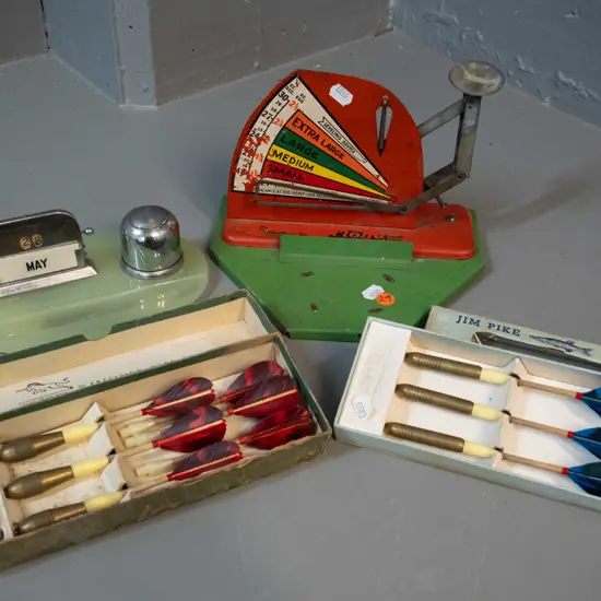 vintage Cyclone egg scale, green glass based inkwell & calendar, and 2 sets of vintage darts - wear to egg scale