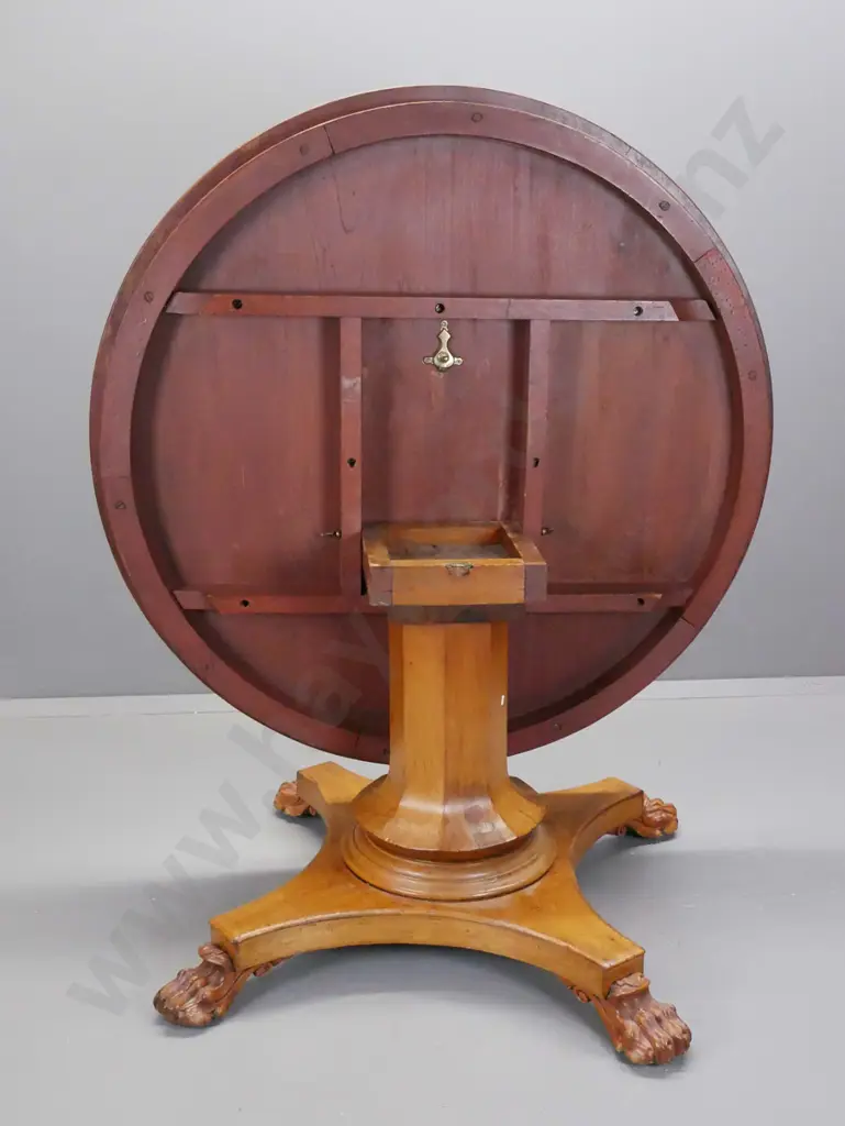 Victorian cedar round tilt-top table on 4-point faceted column base w/carved lion's paw feet, some veneer repairs to Image 1++