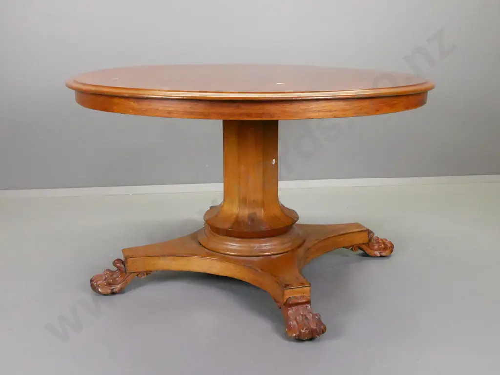Victorian cedar round tilt-top table on 4-point faceted column base w/carved lion's paw feet, some veneer repairs to Image 1++