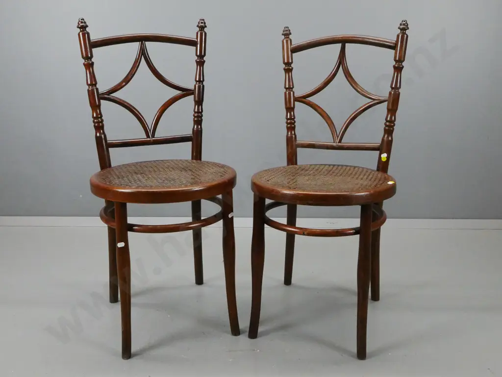 pair of Josef Hoffman bent wood side chairs with diamond design back, cane seat, maker's label under seat H900 W390 D420 Image 1++