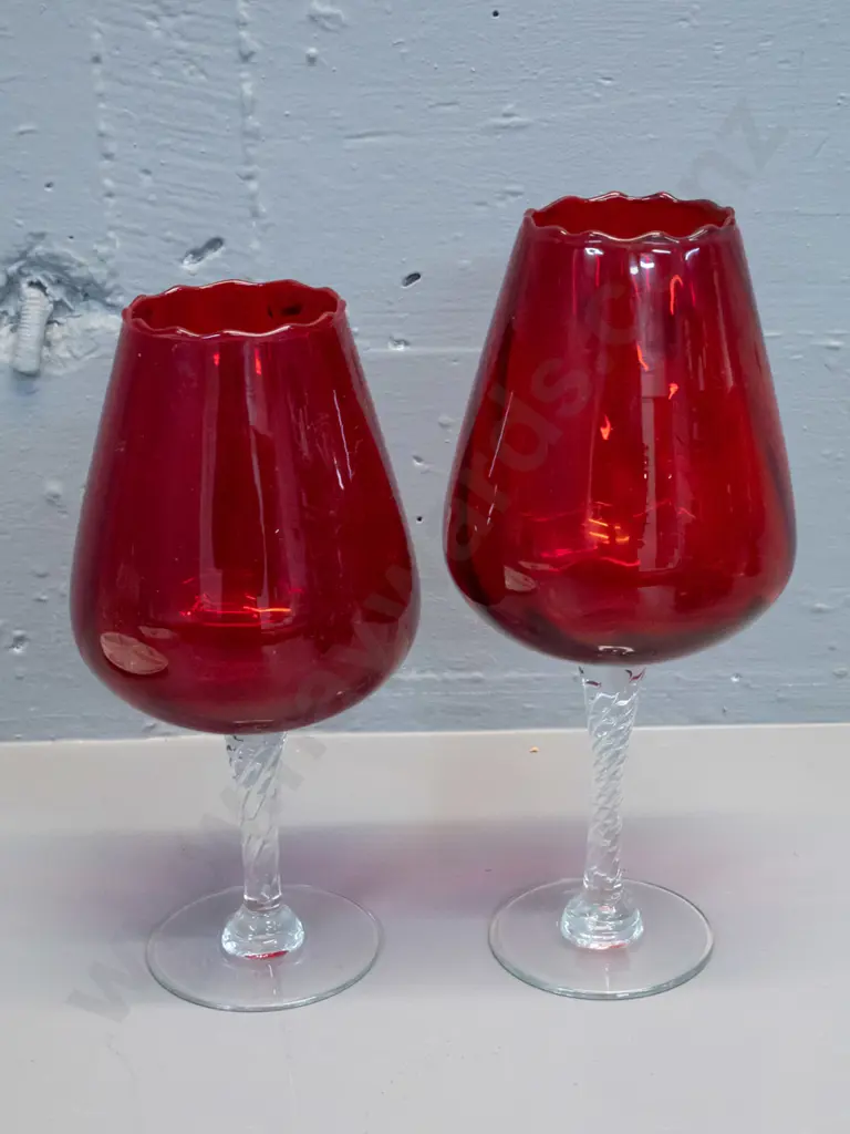 2 red glass goblet shaped vases with swirled clear glass stems - taller one is H-260 Image 1++