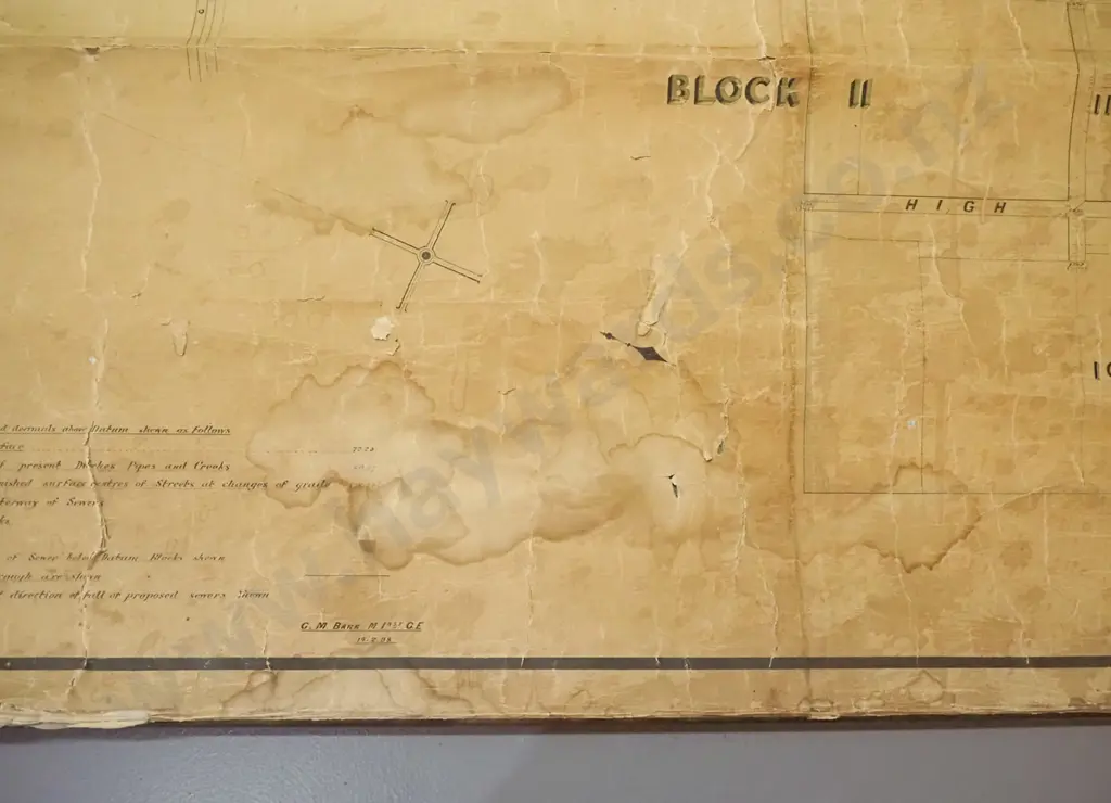 vintage scroll map of The Borough of Mosgiel with mahogany rods (no date) - age related marks, cracks, stains Image 1++