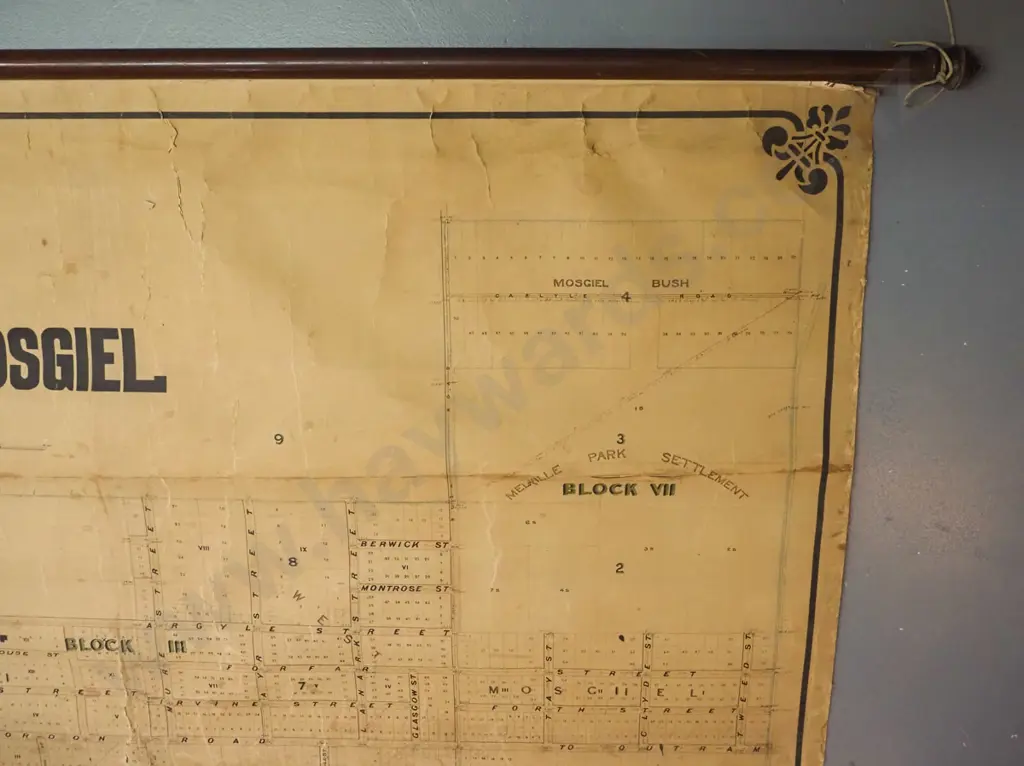 vintage scroll map of The Borough of Mosgiel with mahogany rods (no date) - age related marks, cracks, stains Image 1++