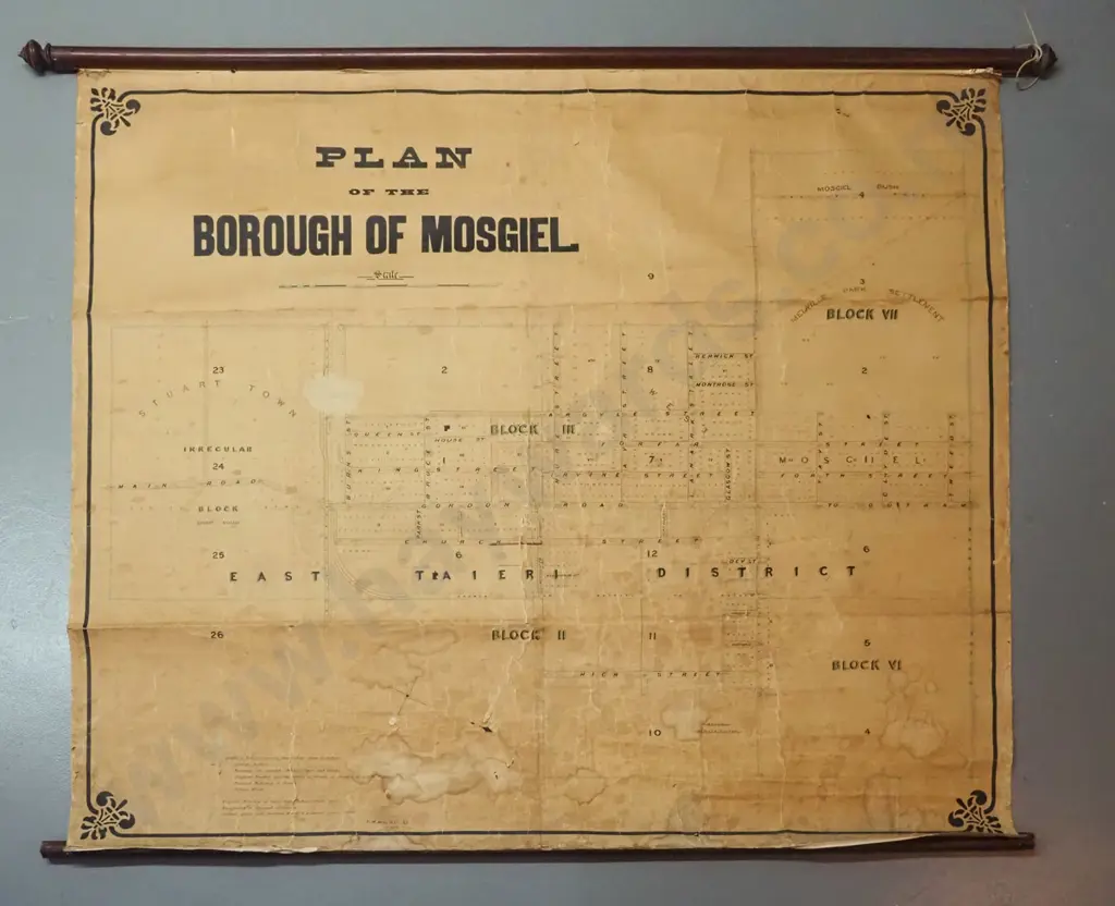 vintage scroll map of The Borough of Mosgiel with mahogany rods (no date) - age related marks, cracks, stains Image 1++