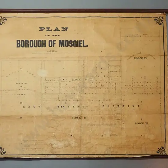 vintage scroll map of The Borough of Mosgiel with mahogany rods (no date) - age related marks, cracks, stains