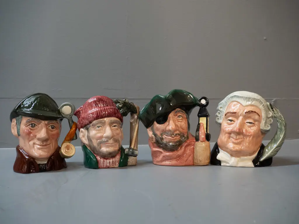 4 small Royal Doulton character jugs - The Sleuth H-110, Smuggler, Lumberjack and Lawyer Image 1++