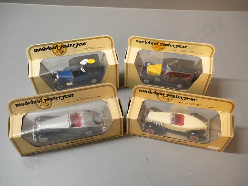 4 boxed Matchbox Models of Yesteryear die-cast vehicles - delivery van, estate car, 2 roadsters Image 1++