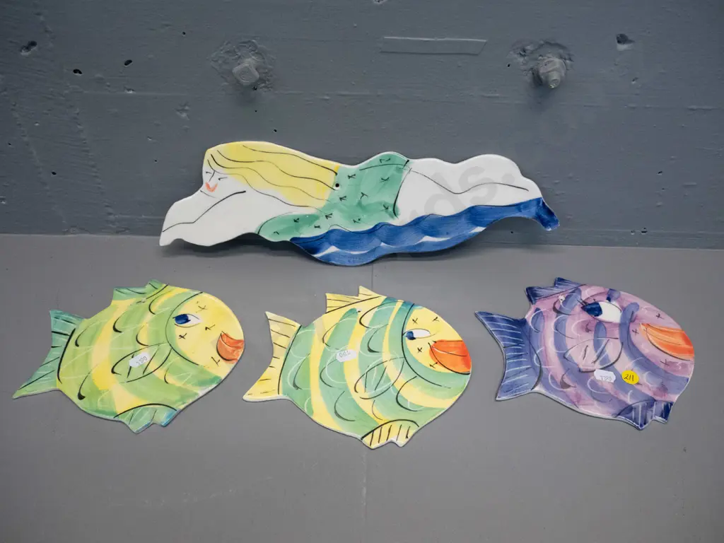 3 wall hanging pottery fish and a swimming woman H120 L380 - all from Laughing Fish Studio, Mapua NZ Image 1++