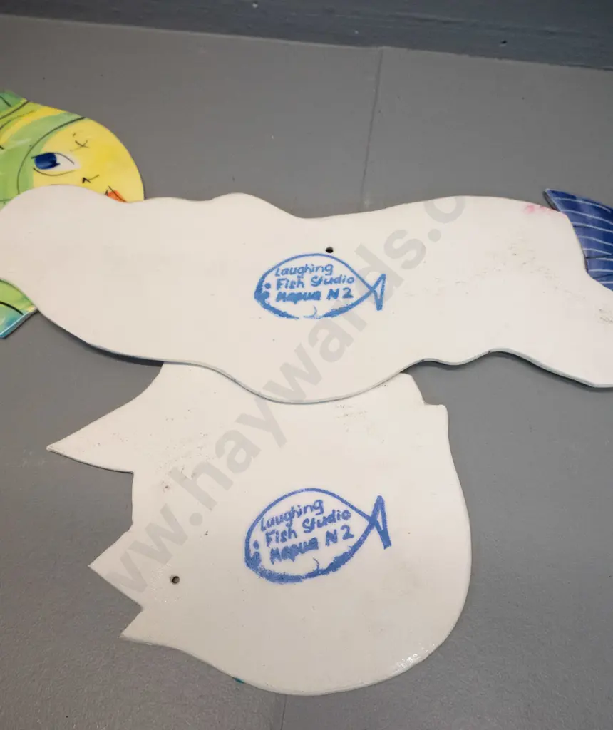 3 wall hanging pottery fish and a swimming woman H120 L380 - all from Laughing Fish Studio, Mapua NZ Image 1++