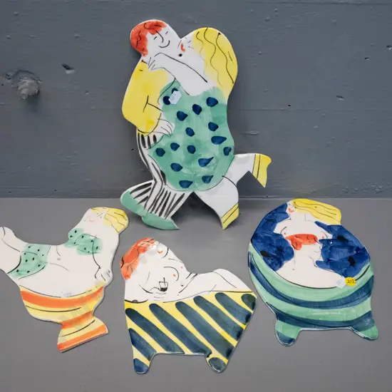 4 wall hanging comic figures - dancing couple H300 W200, woman in bath, etc. - all from Laughing Fish Studio, Mapua NZ