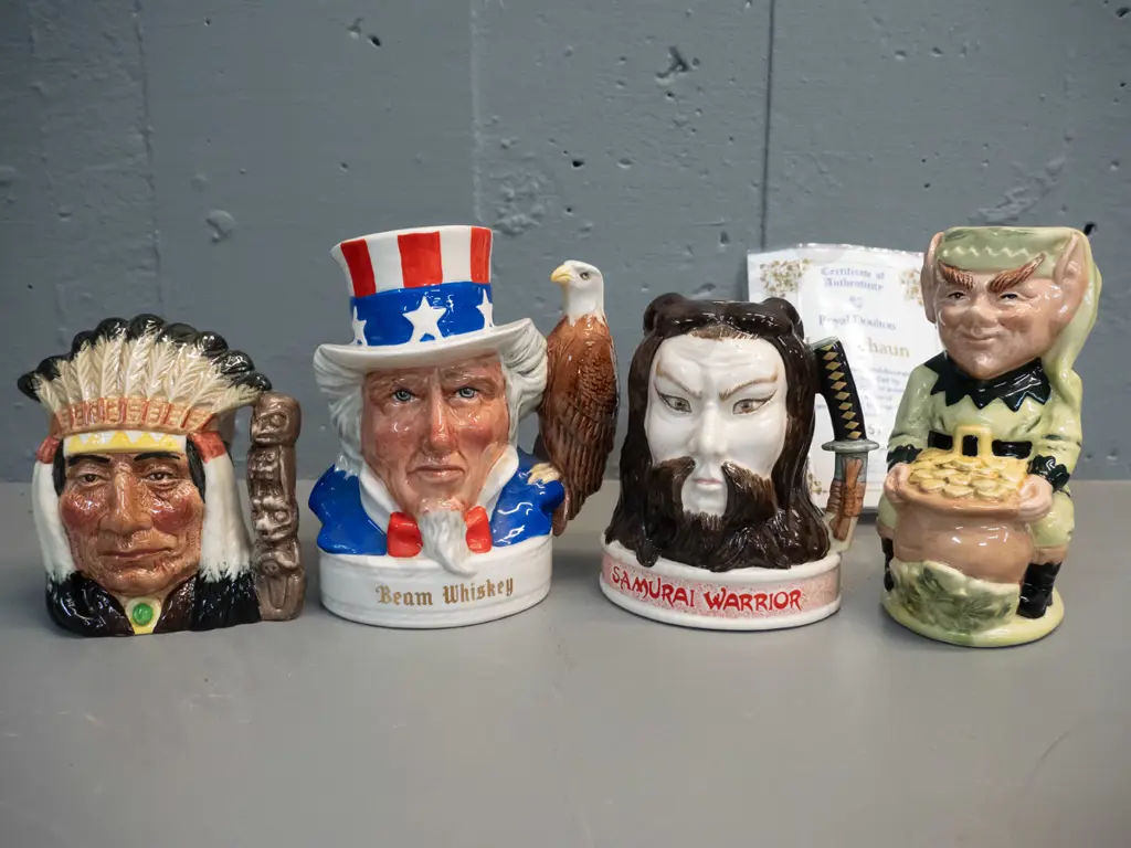 4 small Royal Doulton character jugs - First nations chief, limited edition Leprechaun w/certificate H140, 2 x Jim Beam Image 1++