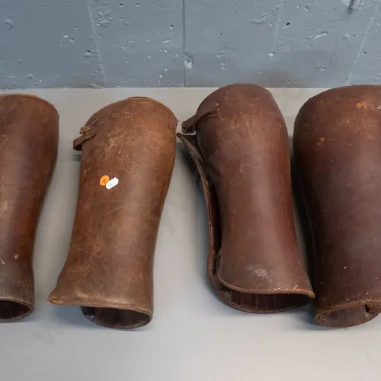 2 pairs vintage leather riding gaiters - general age wear, one missing a buckle, larger marked "15" are L-300