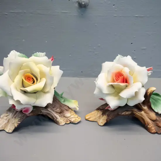 pair of Capodimonte Italian roses - small chips to one bud. H-140 W-160
