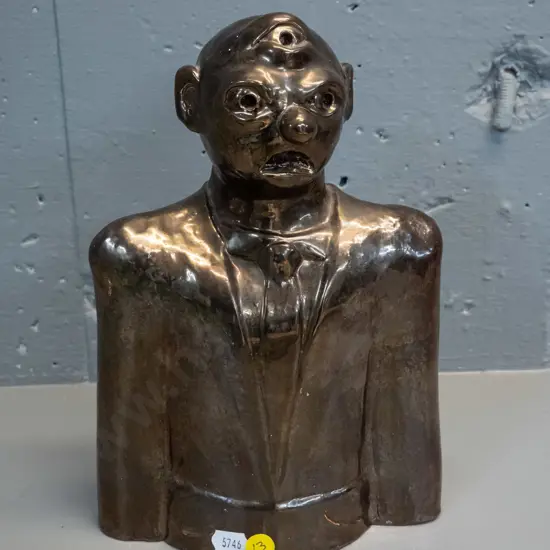 studio pottery bust of suited man with 3rd eye, in metallic copper lustre glaze - '36' impressed on back, maker's marks