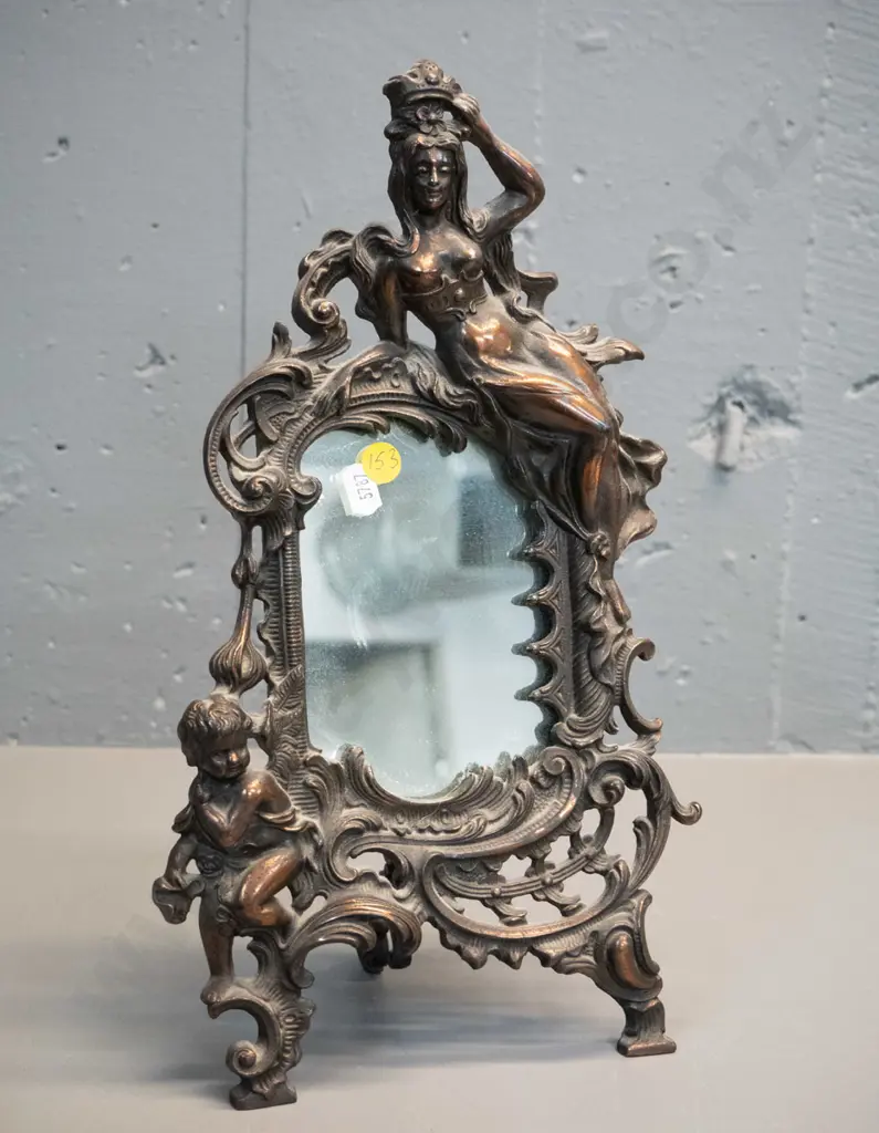 dressing table mirror in ornate cast metal figural frame H-350 W-200 Image 1++