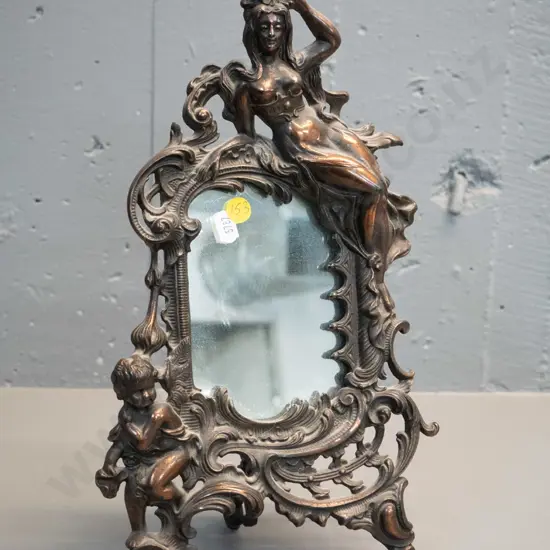 dressing table mirror in ornate cast metal figural frame H-350 W-200