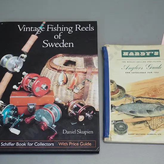 2 books - Vintage Fishing Reels of Sweden book by Daniel Skupien, 2002 and a 1961 Hardy's Angler's Guide catalog, has