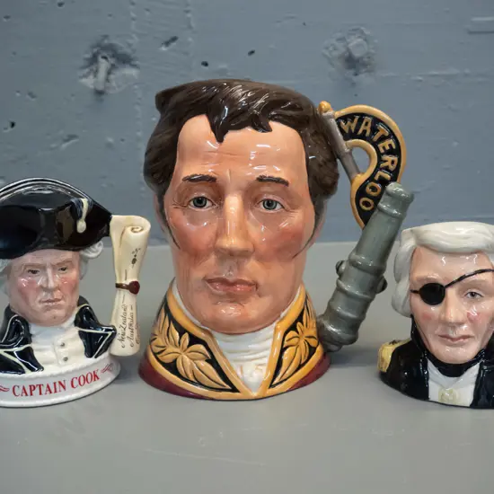 3 Royal Doulton character jugs - Duke of Wellington H-190, Nelson and Jim Beam Captain Cook