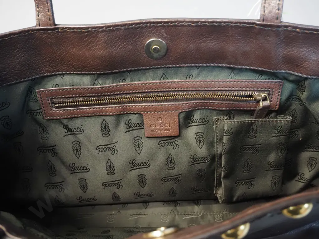 Gucci brown leather tote bag, with brass studs, made in Italy. H270 W460.  Date code 207291-493075 Image 1++