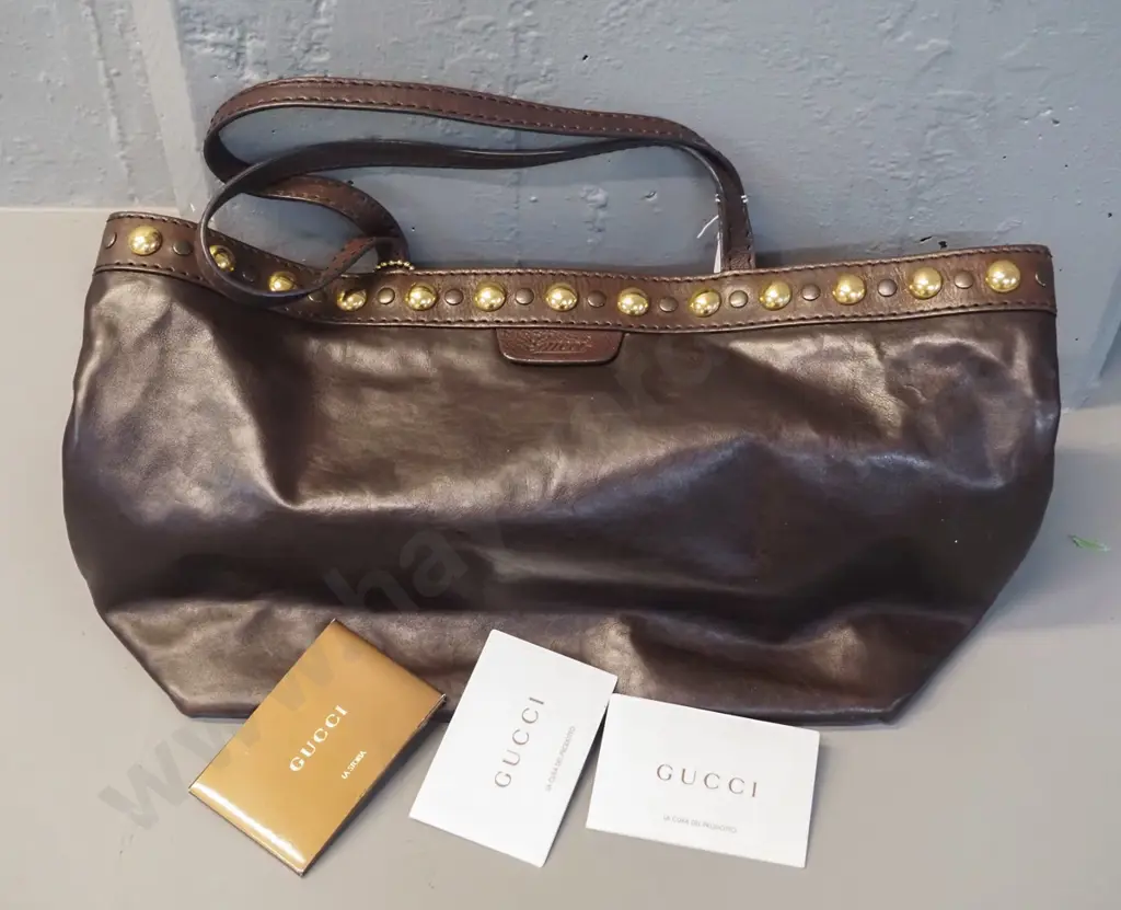 Gucci brown leather tote bag, with brass studs, made in Italy. H270 W460.  Date code 207291-493075 Image 1++