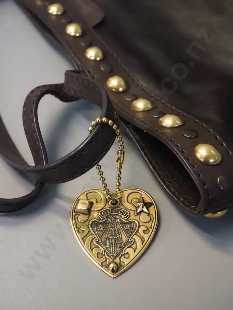 Gucci brown leather tote bag, with brass studs, made in Italy. H270 W460.  Date code 207291-493075 Image 1++