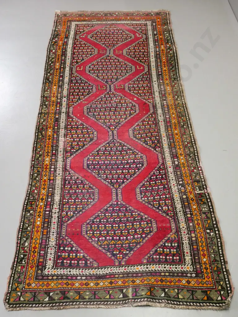 Persian style hand-knotted wool floor rug - red bands and multi-colour border, repairs to edge and patches, overall Image 1++