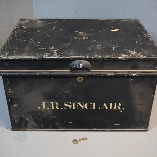 black metal deed or storage box with G.R. royal logo on lid, J.R. Sinclair stencilled on front, working lock with key