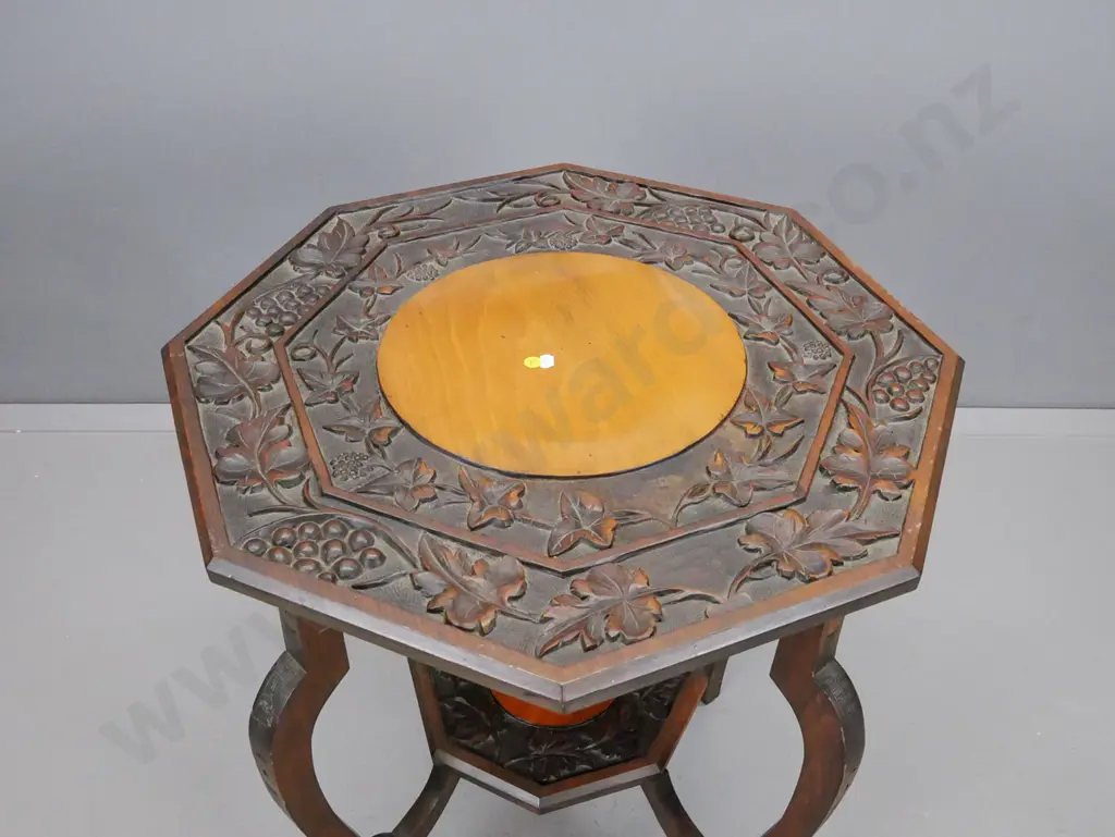 vintage kauri and rimu octagonal top 2-tier side table with grape & vine motif carved borders on 4 sweeping shaped legs Image 1++
