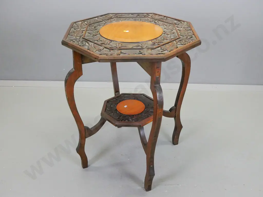 vintage kauri and rimu octagonal top 2-tier side table with grape & vine motif carved borders on 4 sweeping shaped legs Image 1++