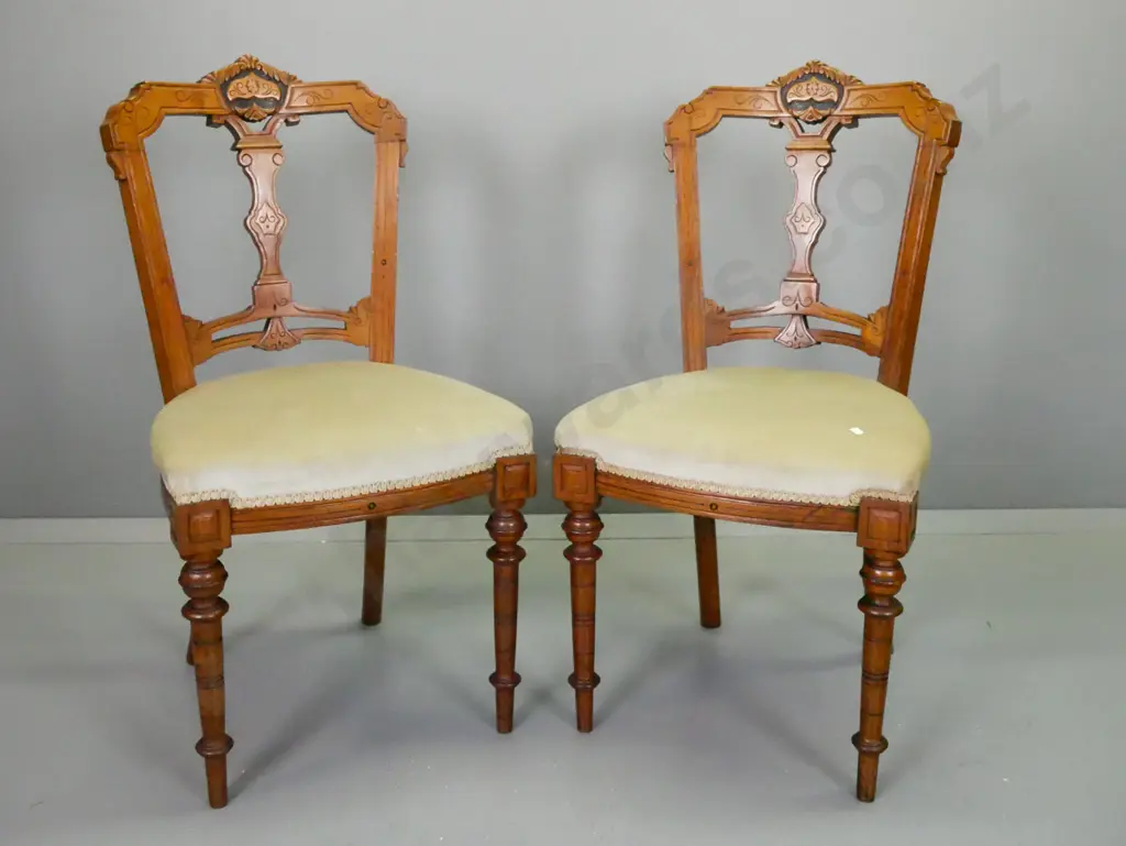 pair of Victorian walnut carved-back chairs with turned front legs, pale green upholstered seats - some fading to Image 1++