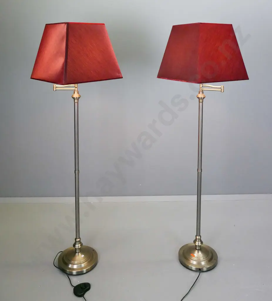 pair of metal swing-adjustable fluted column standard lamps with foot switches, crimson square tapered shades - some Image 1++