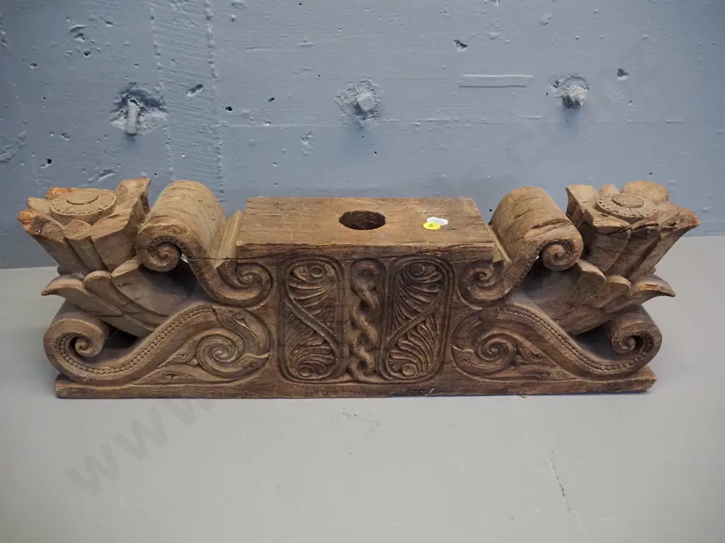 pair of hand-carved teak lintels with foliate & scrolling decoration, both large holes drilled through centre, chips to Image 1++