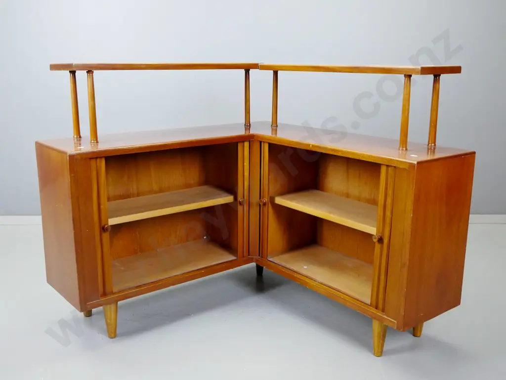 retro mahogany corner unit with top shelf on round supports, 4 sliding tambour doors - some staining to polish on top Image 1++