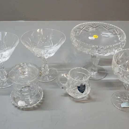 6 assorted cut crystal items - Waterford champagne glasses (one w/ fine chips) and mustard pot, Edinburgh small comport,