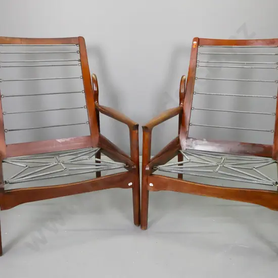 pair of mid-century mahogany lounge chairs with concord shaped arms - no squabs, some scratching and wear to finish, one