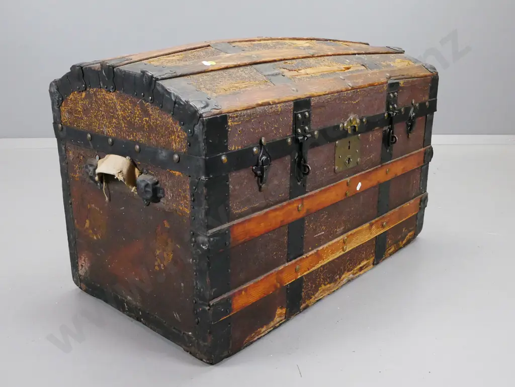vintage dome-top Saratoga trunk with timber slats, replaced handles, overall wear and tear, damage to Image 1++