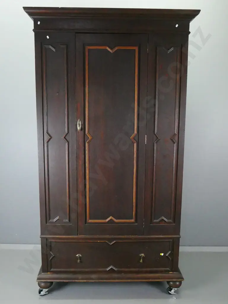 vintage oak single door wardrobe with panelled sides and door, moulded trim to drawer and door, bevelled mirror inside Image 1++