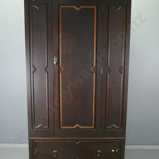 vintage oak single door wardrobe with panelled sides and door, moulded trim to drawer and door, bevelled mirror inside