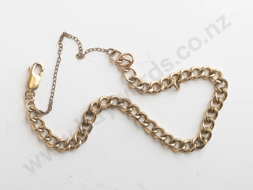 gold bracelet with safety chain Image 1++