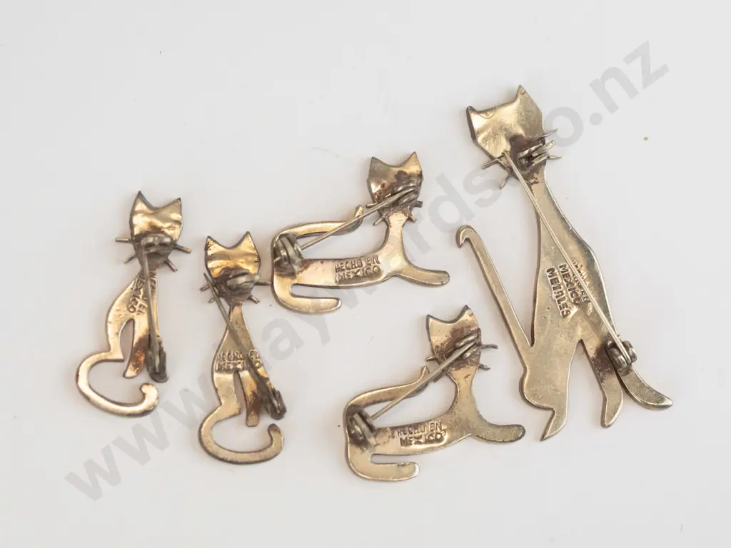 5 cat brooches Image 1++