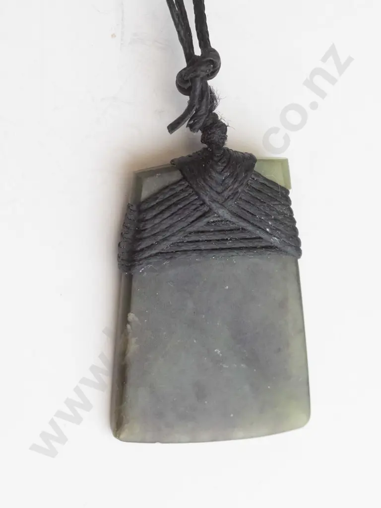 greenstone pendant on leather strand Image 1++