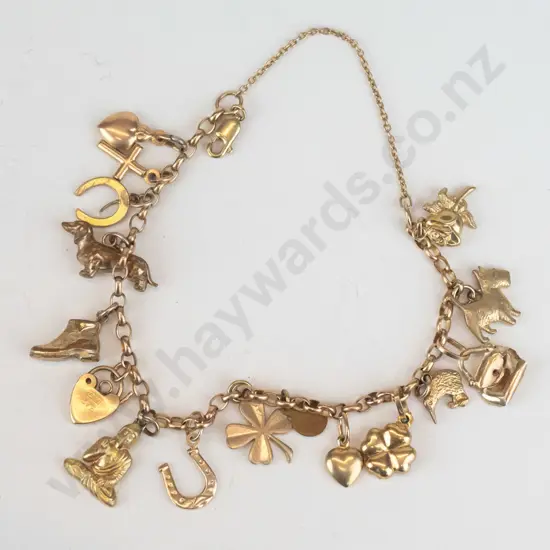 charm bracelet with various charms stamped 375