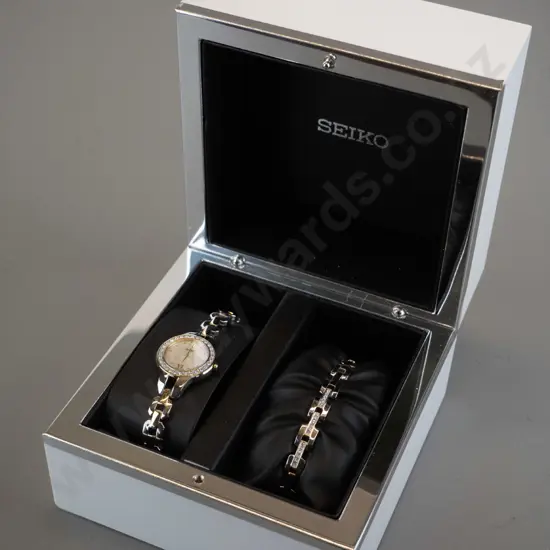 ladies Seiko watch with mother of pearl face and matching bracelet