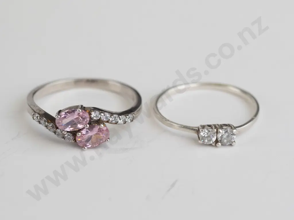 2 silver cz rings both stamped 925 Image 1++