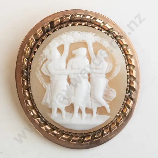 cameo brooch with safety chain stamped 9ct